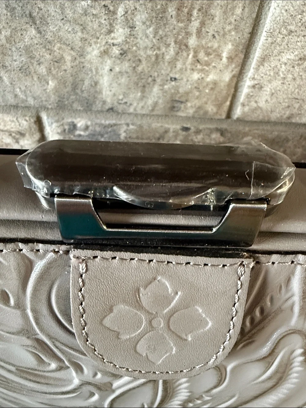 Patricia Nash Embossed Floral Frame Wristlet Bag in Taupe